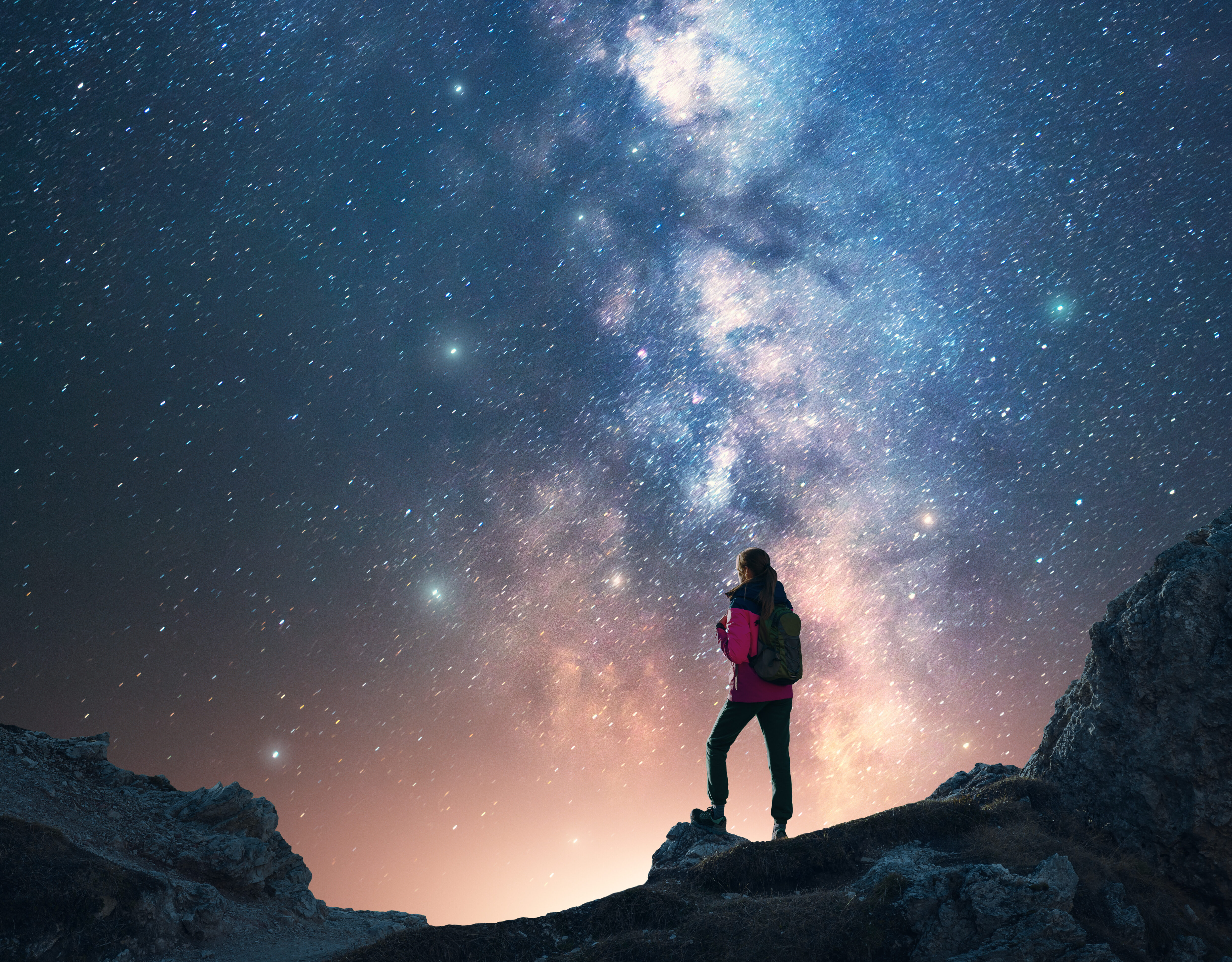 milky way and woman on mountain peak at starry nig 2026 03 24 06 14 08 utc e1785150153252