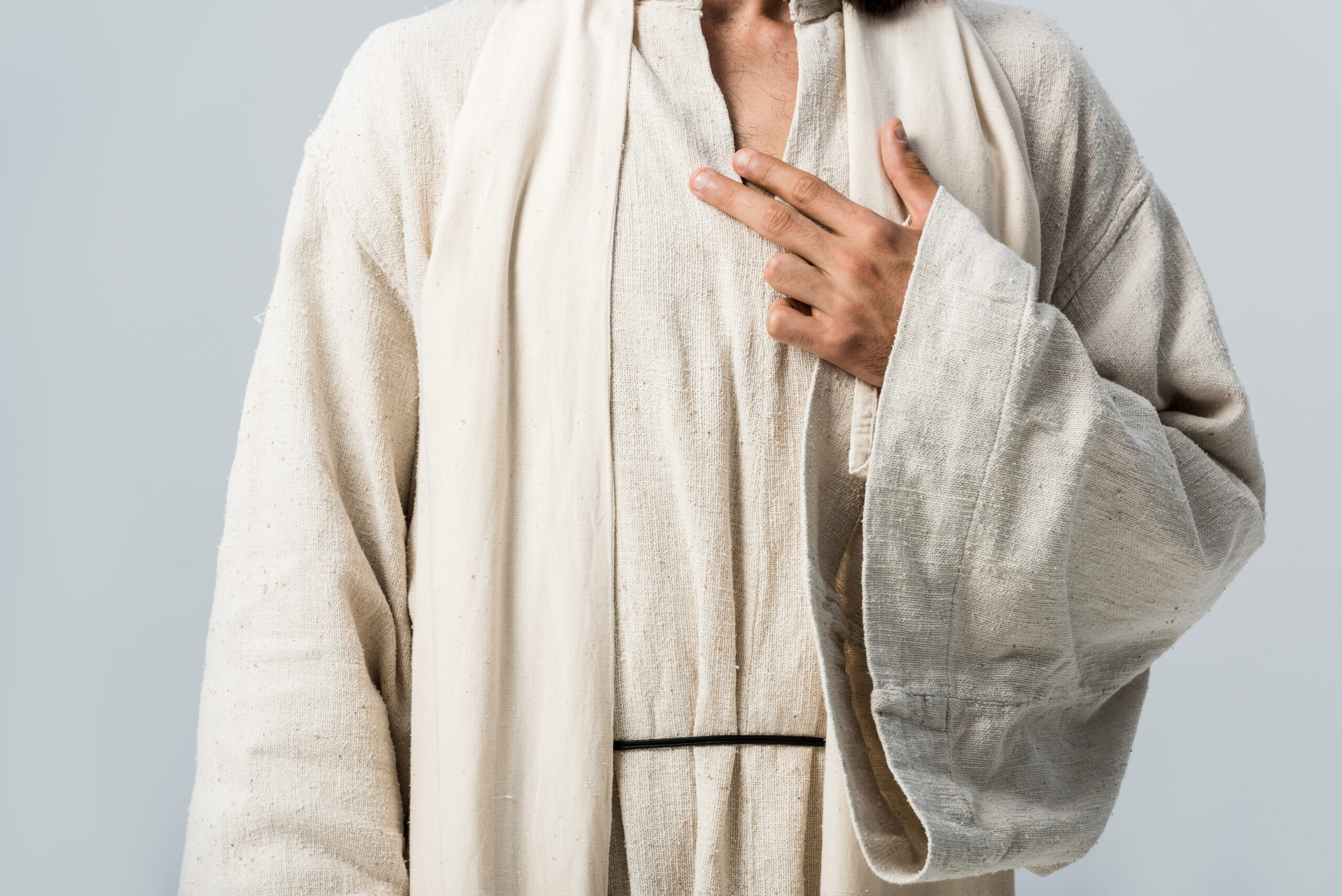 cropped view of man with hand on chest standing is 2026 01 05 23 41 19 utc scaled