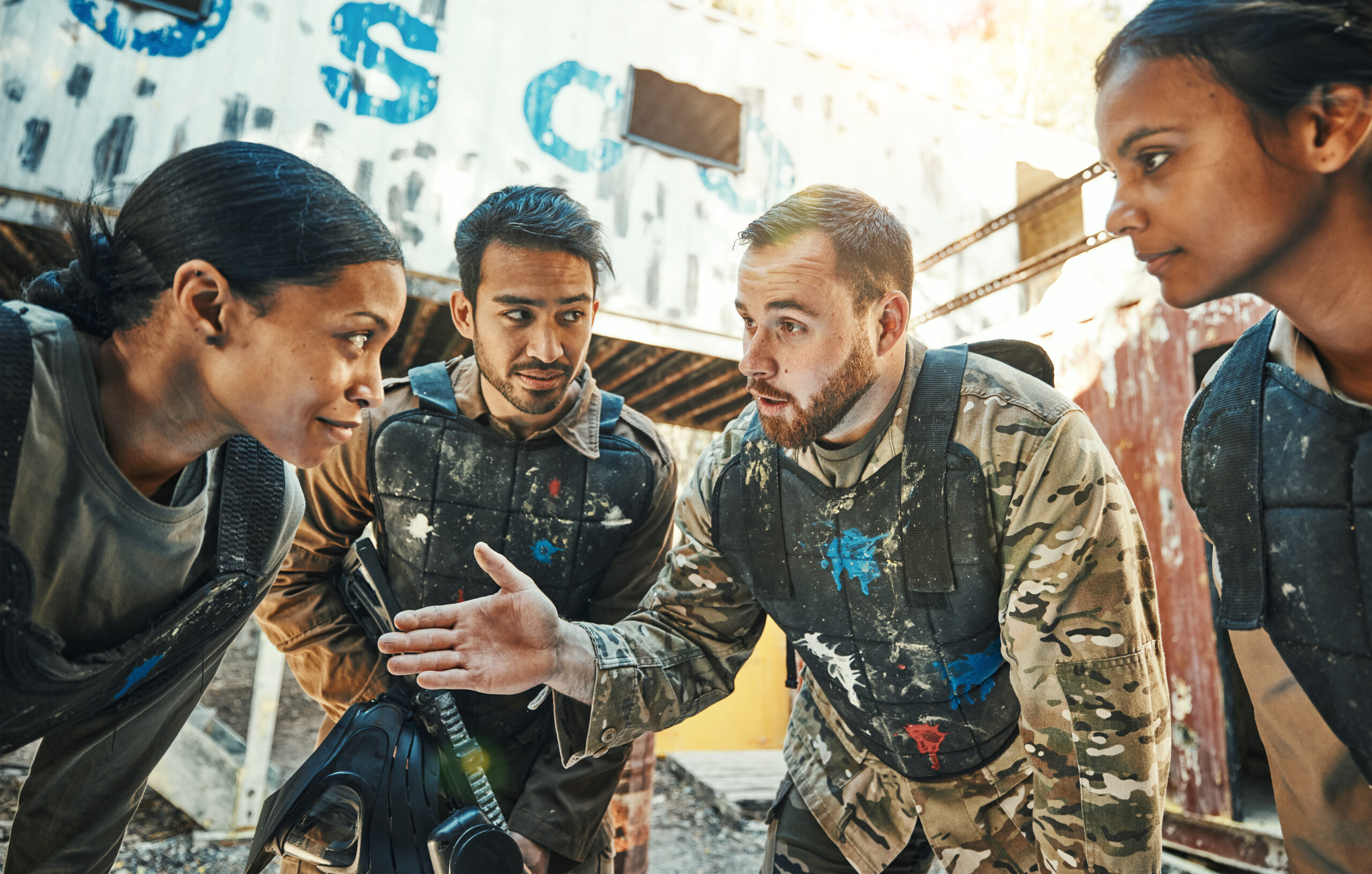 paintball team discussing strategy on a damaged bu 2026 01 09 11 11 22 utc scaled
